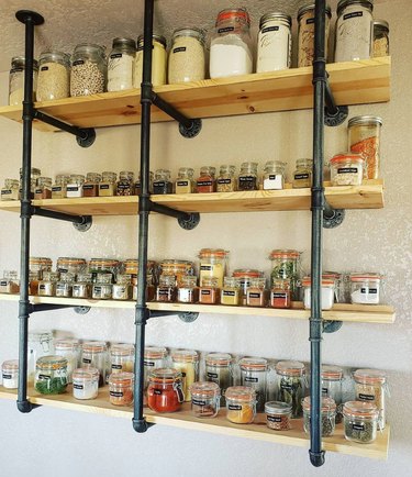 Shelves with spices organized.