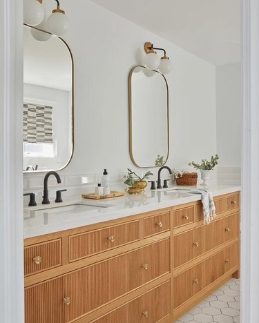 wood front double vanity with reeded drawers