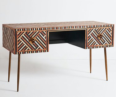bone in-lay desk with striking pattern and drawers for storage