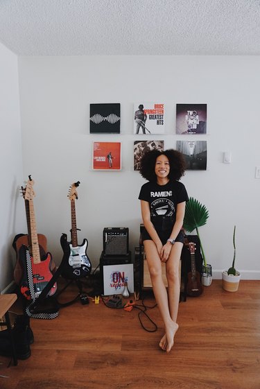 photo of Jenay Ross near musical instruments