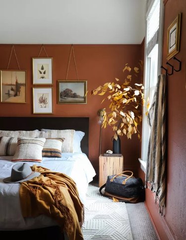 mustard yellow and rust bedroom color idea