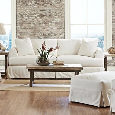 white slip cover sofa