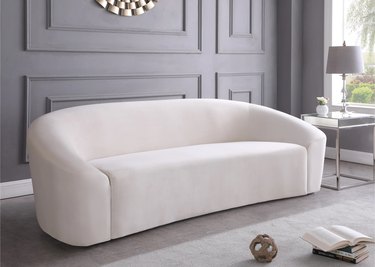 rounded white sofa