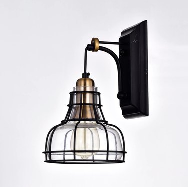 1-Light Black and Antique Gold Indoor Wall Sconce with Clear Glass