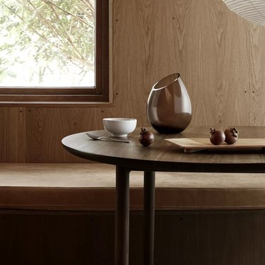 modern glass vase on wooden table