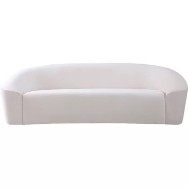 white rounded couch