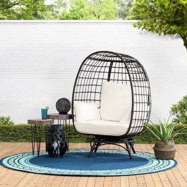 Highland Dunes Wellow Baytree Egg Swivel Patio Chair with Cushions