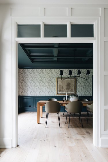 teal, white, and gray dining room color idea with chair rail