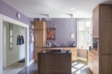 lavender kitchen walls with wood cabinetry