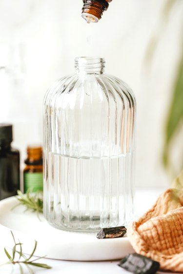 Combine witch hazel and essential oils for a room-cleansing spray