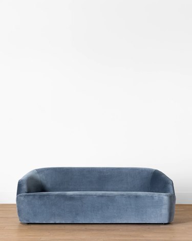 McGee & Co. blue curved sofa