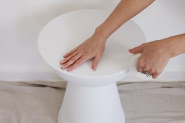 Covering surface of side table with mesh drywall tape