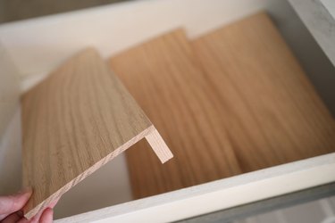 Placing wooden inserts into drawer