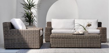 Outdoor furniture set with white cushions