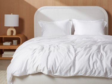 white sateen bedding on bed