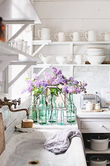 white french country style kitchen with open shelves