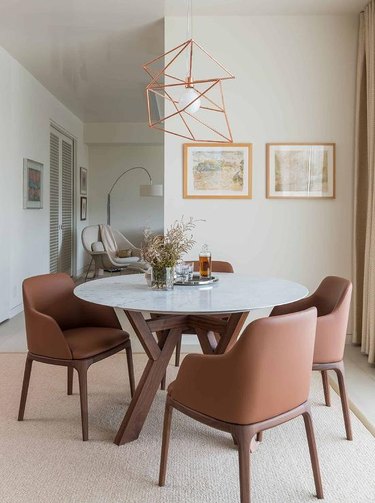 room with brown furniture and copper light