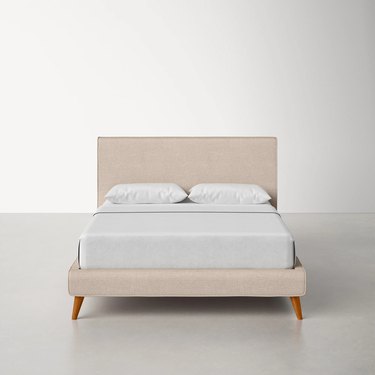 AllModern Williams Solid Wood and Upholstered Bed