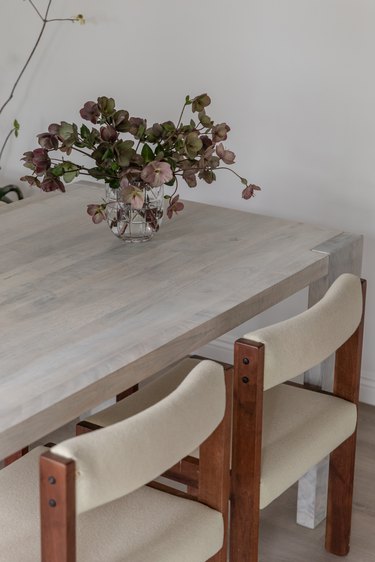 dining room detail with table and vintage teak chairs