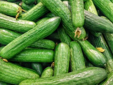 cucumbers piled on top of one another