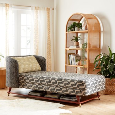 daybed and rattan shelf