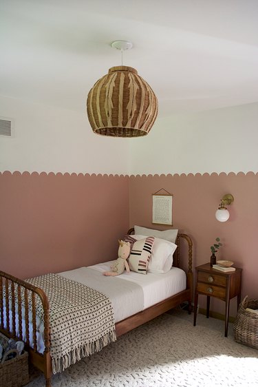 mauve wall paint with brown wood furniture