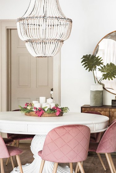 dining room with blush chairs and taupe trim
