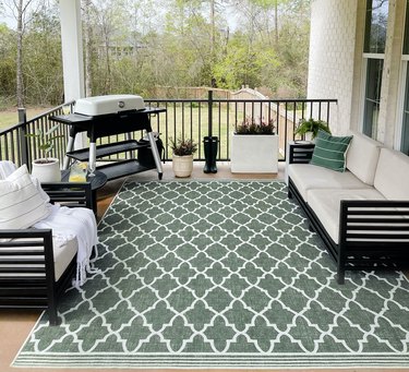 outdoor patio area with rug