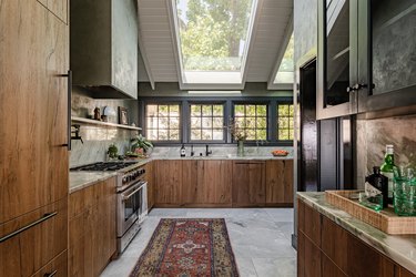 modern kitchen with runner in front of stove