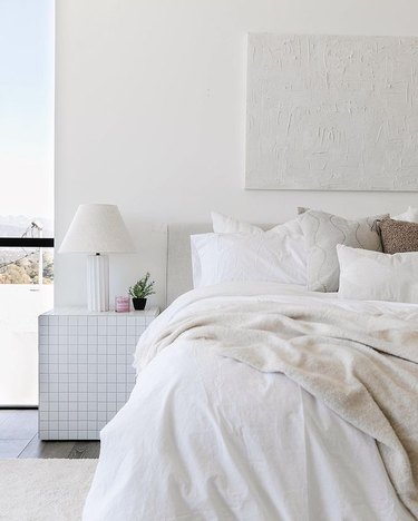tiled ikea nightstand in white bedroom