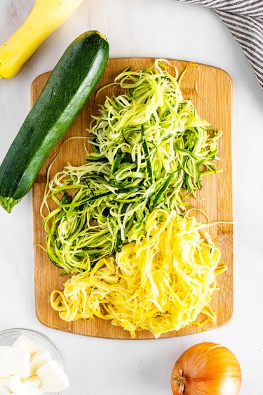 Spiralized summer squash on a cutting board