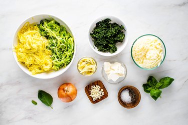 Ingredients for spinach artichoke summer squash bake