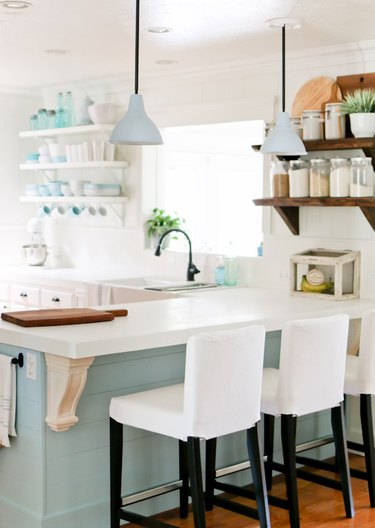 DIY solid surface kitchen countertops with blue green cabinets