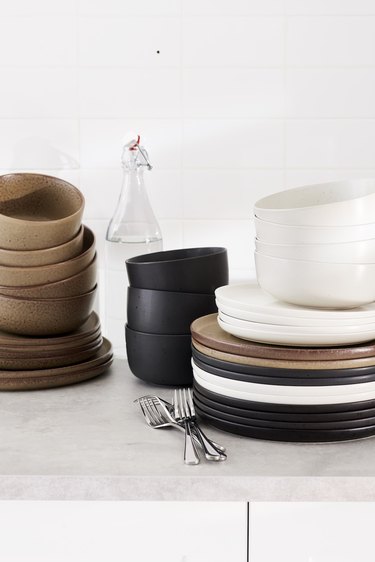 plates and bowls in neutral tones