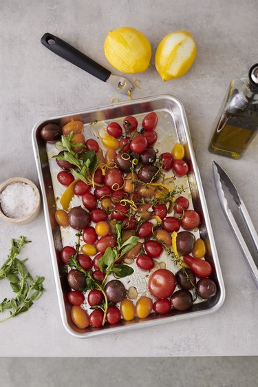 roasted tomatoes on baking sheet