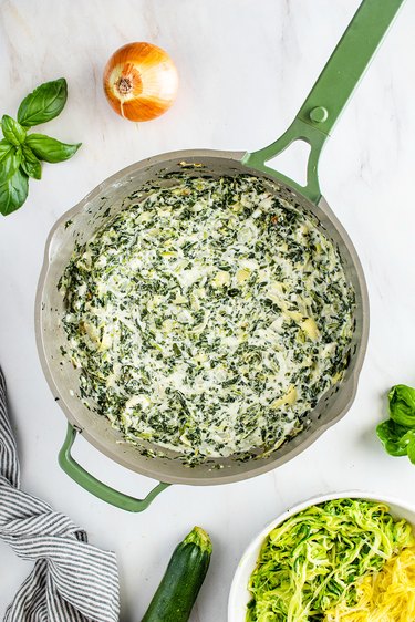 Spinach artichoke mixture in a large pan