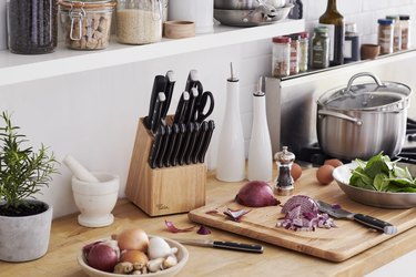 knife block and chopped vegetables