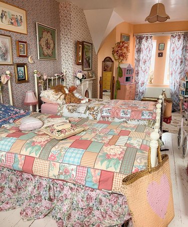 maximalist bedroom with two twin beds covered in quilts