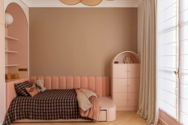 The daughter's pink bedroom.
