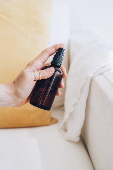 Spray DIY upholstery spray to get rid of smells