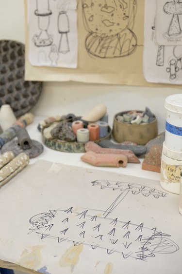 studio with drawings and tools