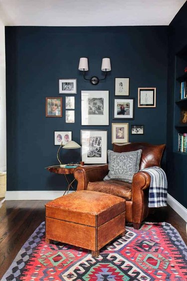 navy blue walls with brown furniture