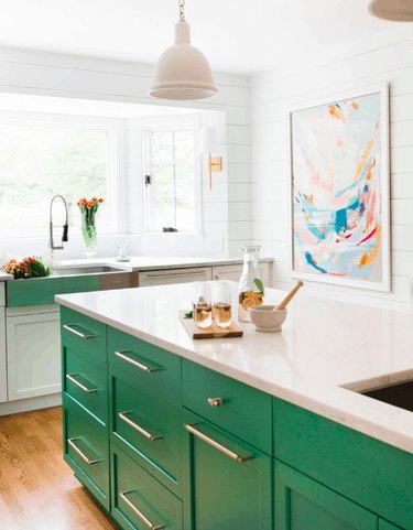 Green island in a white kitchen