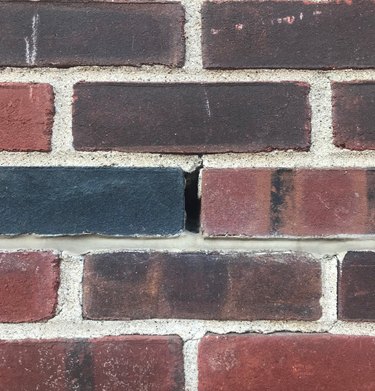 A weep hole on brick house