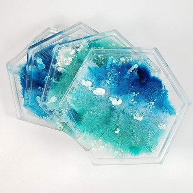 clear hexagon coasters with blue design