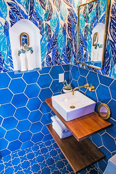 cobalt blue hex bathroom with wallpaper