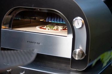 countertop pizza oven with pizza inside