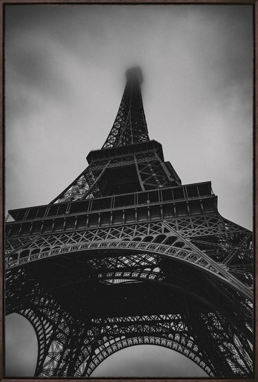 black and white foggy photo of Eiffel Tower