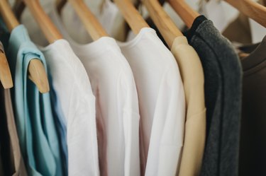 Clothes hanging in a closet