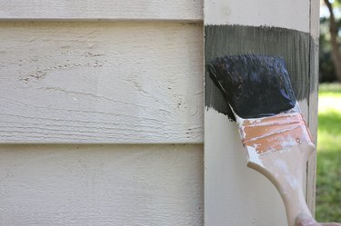 Painting shed with dark gray color called Broadway